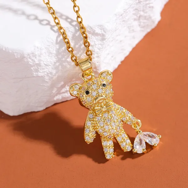 Gold_Heart_Pulling_Bear_Pendants_For_Women